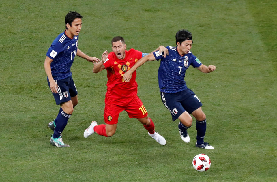 <p>Belgium’s Eden Hazard in action with Japan’s Makoto Hasebe and Gaku Shibasaki REUTERS/Murad Sezer </p>