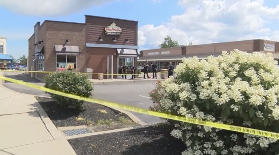 The boy fell into the grease trap behind a Tim Hortons restaurant in New York. Source: WGN9