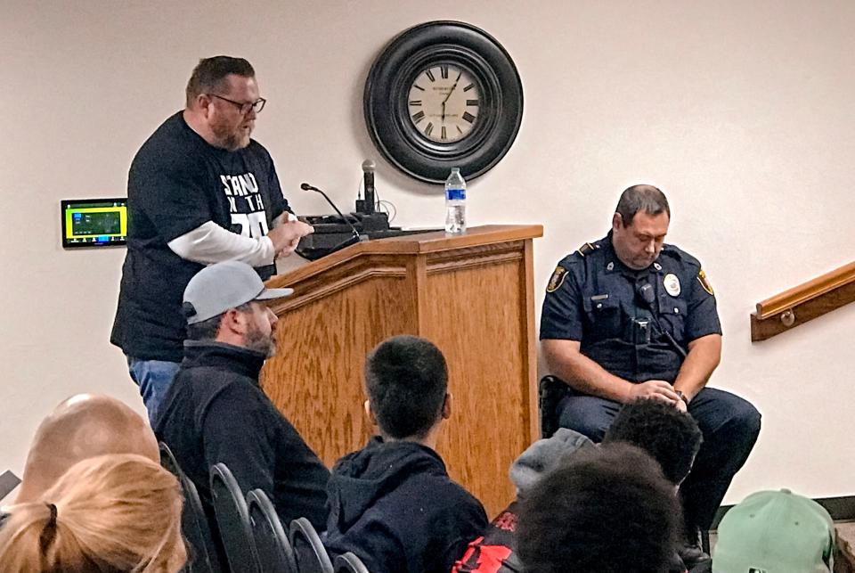 Westmoore Quarterback Club President Kendal Zielny addresses the Moore Public School board in support of fired Westmoore football coach Lorenzo Williams on Monday, Dec. 11, 2023, in Moore, Okla.