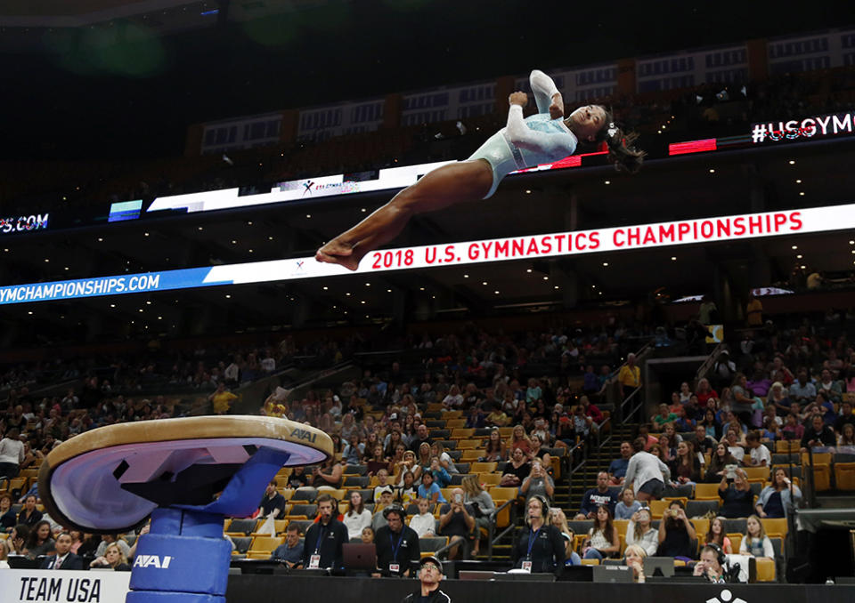 <p>Simone Biles warms up on the vault at the U.S. Gymnastics Championships on Aug. 19, 2018, in Boston. </p>