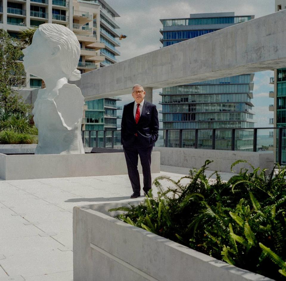 Alberto Ibargüen standing next to “The Well” by Enrique Martinez Celaya, on the rooftop sculpture garden in Coconut Grove, Florida, where the Knight Foundation offices are located.