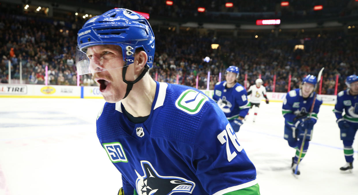 If Antoine Roussel of the Vancouver Canucks is a man of his word, his upper lip will be warm for the rest of the 2019-20 season. (Photo by Jeff Vinnick/NHLI via Getty Images)