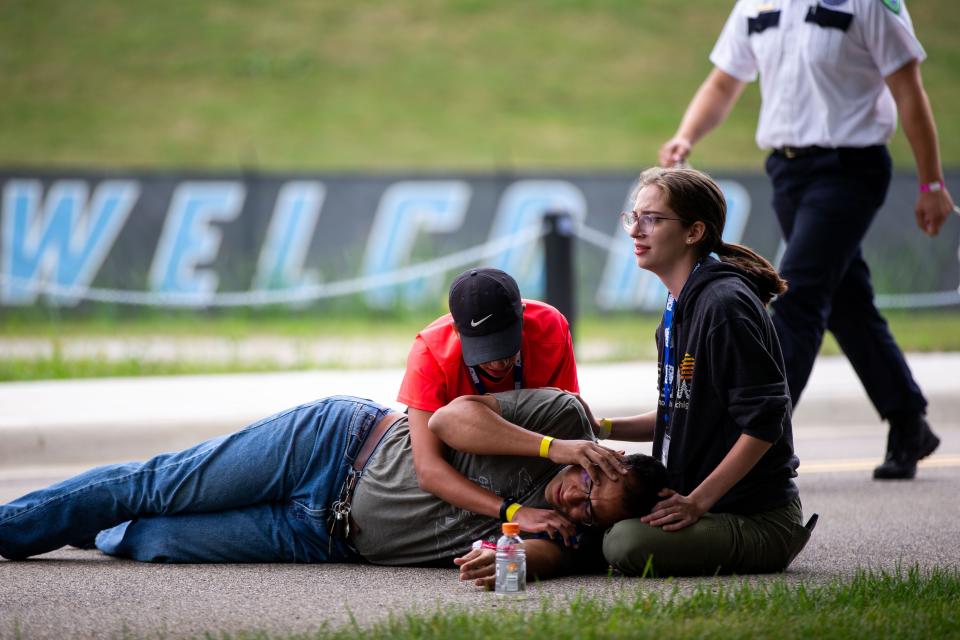 Actors and first responders participate in a mass casualty training exercise near Lubbers Stadium in Allendale. The training simulated a crowd struck by a vehicle.