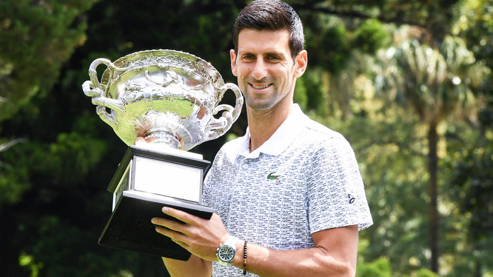 Novak Djokovic, pictured here celebrating with the Australian Open trophy.