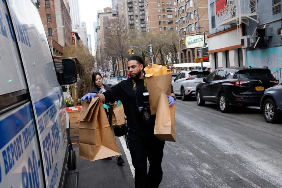 Members of NYPD’s Crime Scene Unit collected evidence from the apartment, located at 206 East 31st Street. Kevin C. Downs for NY Post