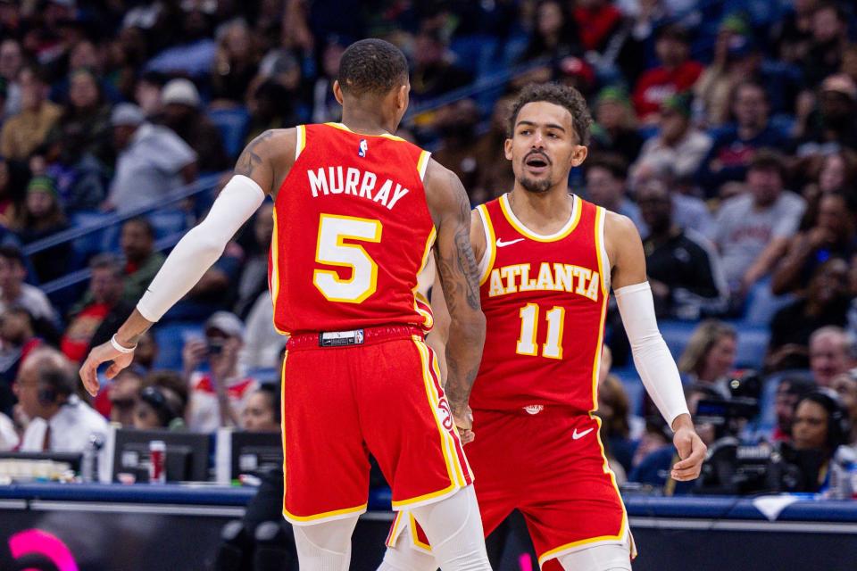 Guards Trae Young (11) and Dejounte Murray (5) have not meshed as well together on the court as the Atlanta Hawks had hoped.