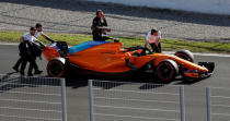 Motor Racing - F1 Formula One - Formula One Test Session - Circuit de Barcelona-Catalunya, Montmelo, Spain - March 6, 2018 The car of McLaren's Stoffel Vandoorne is taken off the track REUTERS/Juan Medina