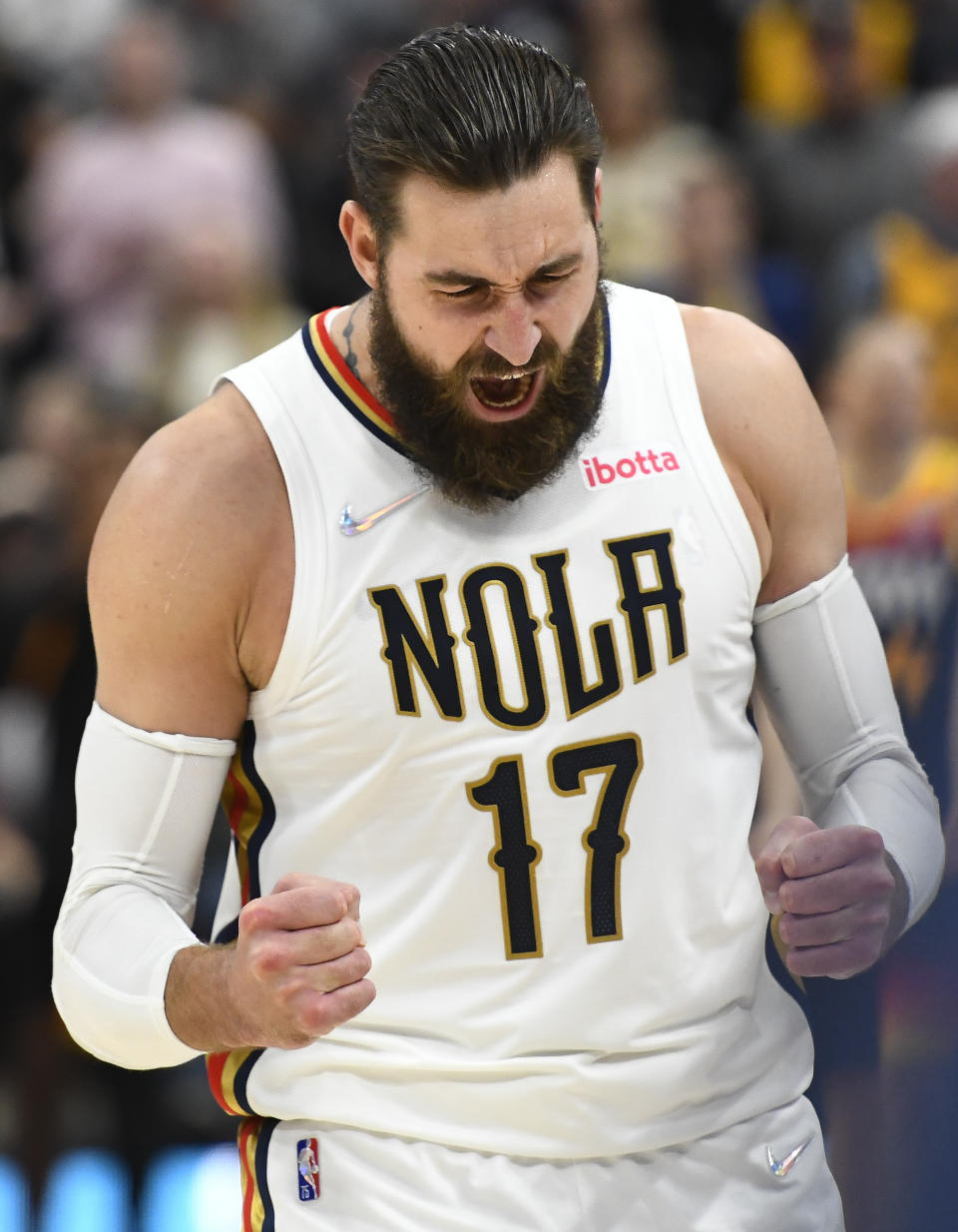 New Orleans Pelicans center Jonas Valanciunas celebrates a play during the second half of the team's NBA basketball game against the Utah Jazz on Friday, Nov. 26, 2021, in Salt Lake City. (AP Photo/Alex Goodlett)