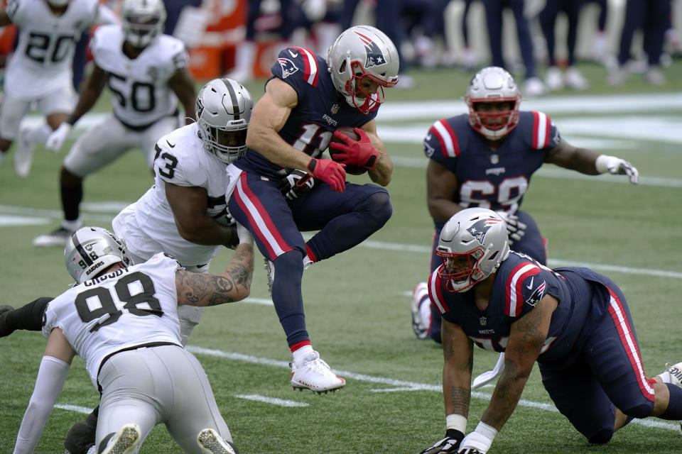 Las Vegas Raiders defensive lineman Maurice Hurst (73) tackles New England Patriots wide receiver Julian Edelman (11) in the first half of an NFL football game, Sunday, Sept. 27, 2020, in Foxborough, Mass. (AP Photo/Steven Senne)