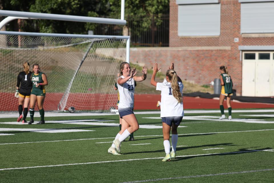 Great Falls High's Emma Pachek (23) celebrates one of her three goals in a win over CMR at Memorial Stadium Thursday.