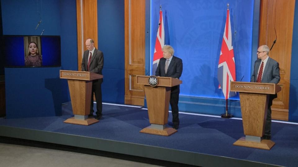 <p>Boris Johnson (centre) hosts a press conference with advisers</p> (PA)