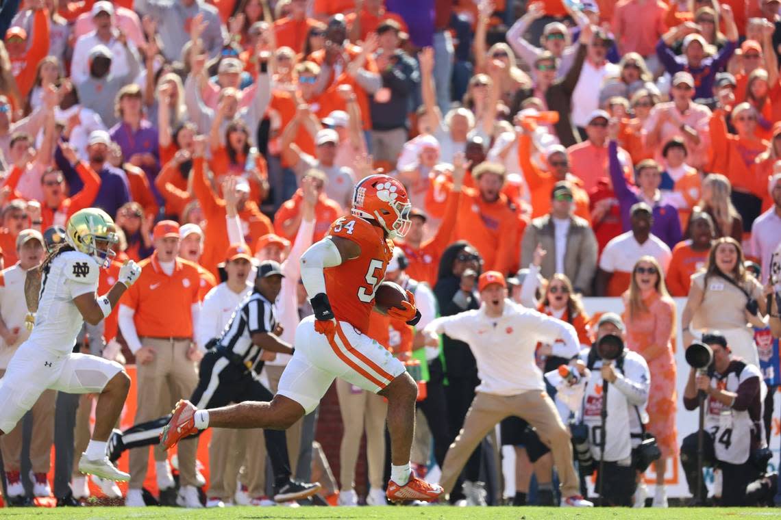 Clemson linebacker Jeremiah Trotter Jr. returns a second-quarter interception for a touchdown in the Tigers’ 31-23 win over Notre Dame on Nov. 4. Trotter has decided not play against Kentucky in the TaxSlayer Gator Bowl.