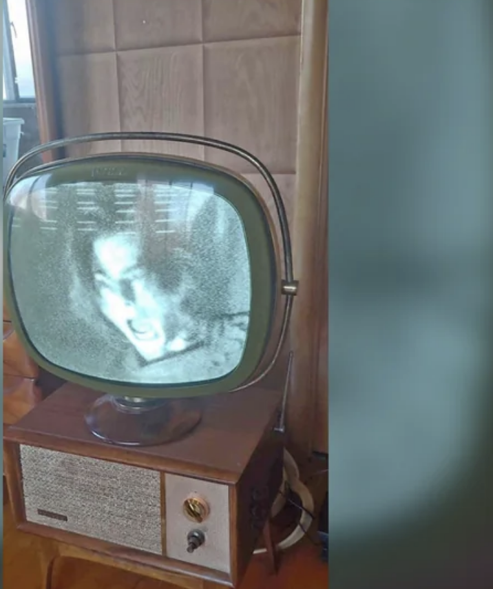 image of a person yelling on the screen of an old tv