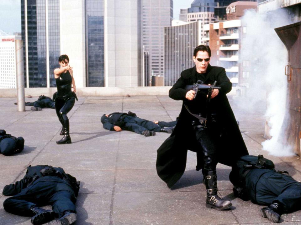 Carrie-Anne Moss and Keanu Reeves in 1999’s ‘The Matrix'Rex Features