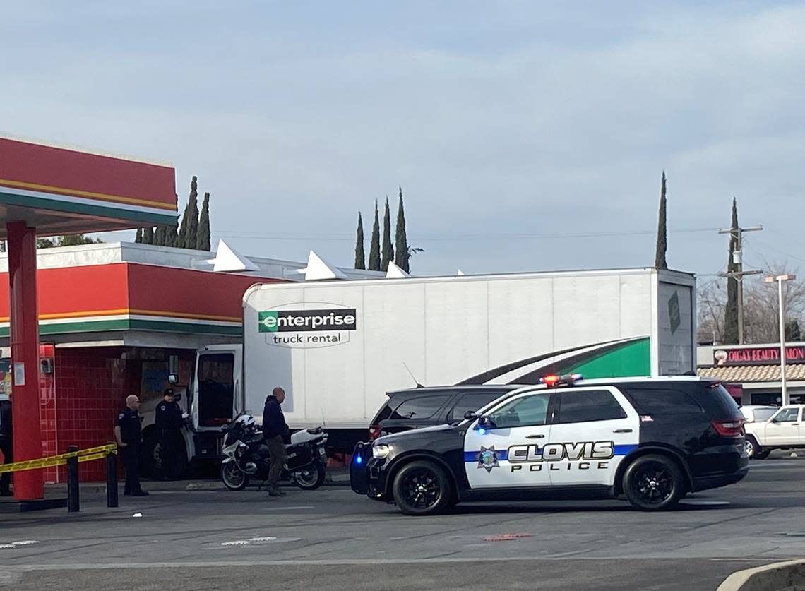 Police investigate at a gas station in Fresno where a man ran from the rental truck he stole in Clovis on Tuesday, Feb. 21, 2023, according to a Clovis police spokesperson. THADDEUS MILLER/tmiller@fresnobee.com