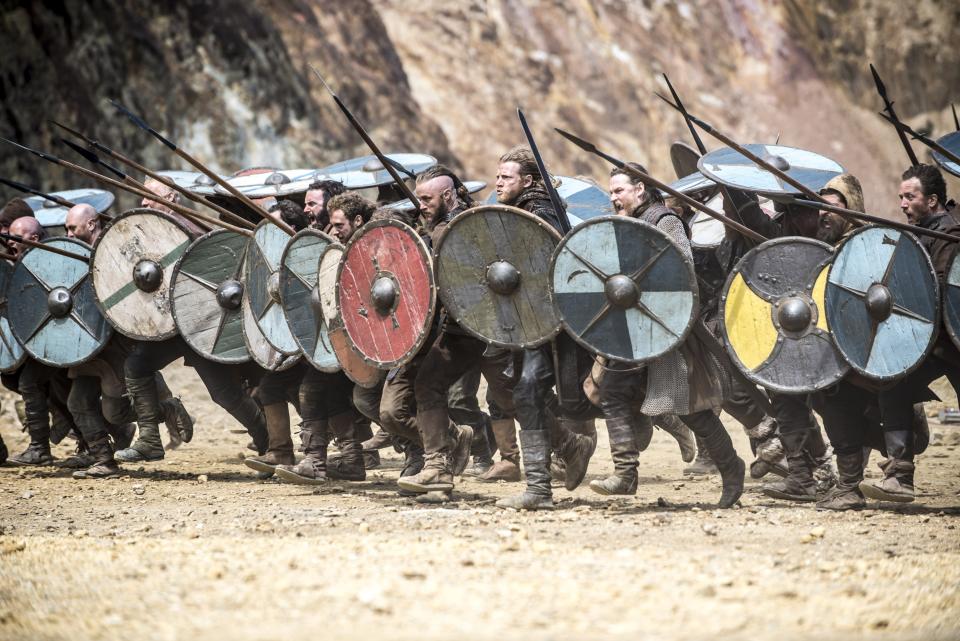 In this photo dated July, 4 2013 is a battle scene from television show Vikings, History’s brooding and brutal drama about the 8th-century Nordic warrior Ragnar Lothbrok. After a six-month shoot in Ireland, season two debuts Thursday night sporting a bigger scale, more confident pace and stronger entertainment than last year’s uneven, at-times plodding inaugural run.(AP Photo/Bernard Walsh/History)