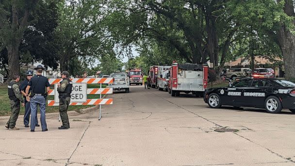 PHOTO: Barricades block off a portion of Elm Street in Laurel, Neb., Aug. 4, 2022. The Nebraska State Patrol is investigating a situation with multiple fatalities. (The Norfolk Daily News via AP)