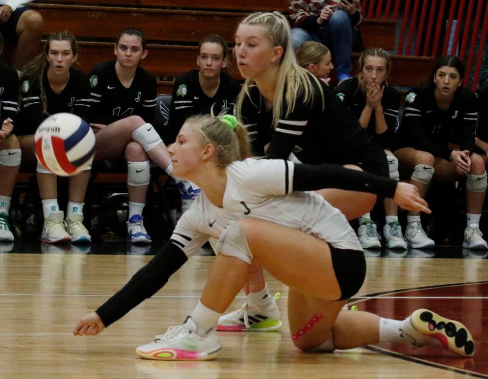 Jupiter Warriors #2 Macy Mcamis digs for the ball as teammate #7 Ava Webster looks on during the fourth set. Wildcats tied the game 2 sets a piece coming back from a 2-0 start. Jupiter vs Winter Park at the FHSAA Volleyball Semi Finals at Polk State College in Winter Haven Fl. November 10th 2023 Photo by Calvin Knight