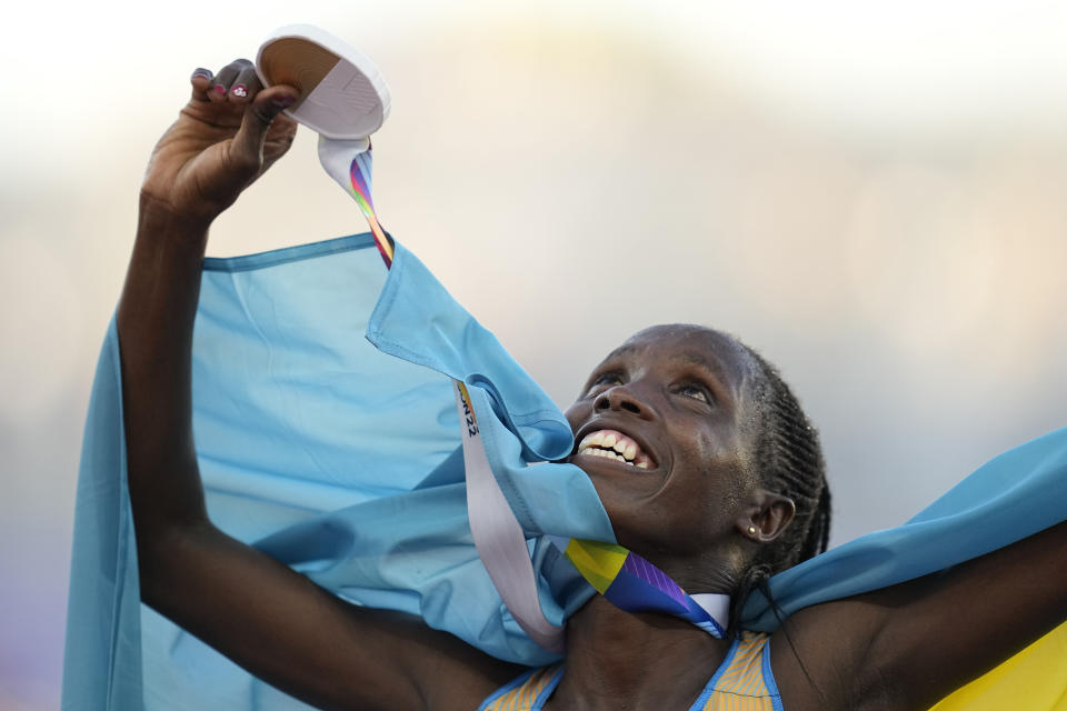 Gold medalist Norah Jeruto, of Kazakhstan, celebrates after her win in the women's 3000-meter steeplechase final at the World Athletics Championships on Wednesday, July 20, 2022, in Eugene, Ore. (AP Photo/Ashley Landis)