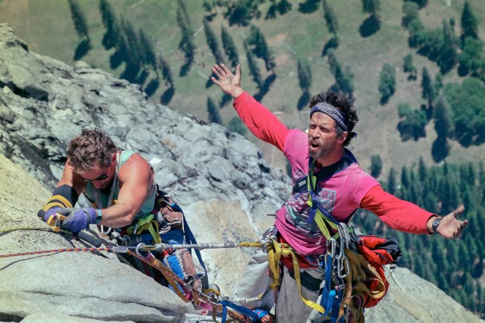 Mike Corbett, right, claims victory at the summit of El Capitan with Mark Wellman, July 1989.