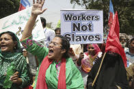 <p>Pakistani workers participate in a rally on the International Labor Day in Lahore, Pakistan, May 1, 2018. Pakistan observed Labor Day on Tuesday along with other nations worldwide. (Photo: K.M. Chaudary/AP) </p>