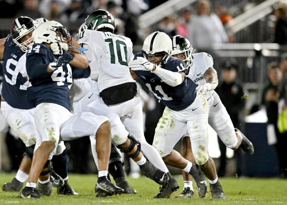 Penn State linebacker Abdul Carter stops Michigan State’s Payton Thorne during the game on Saturday, Nov. 26, 2022.