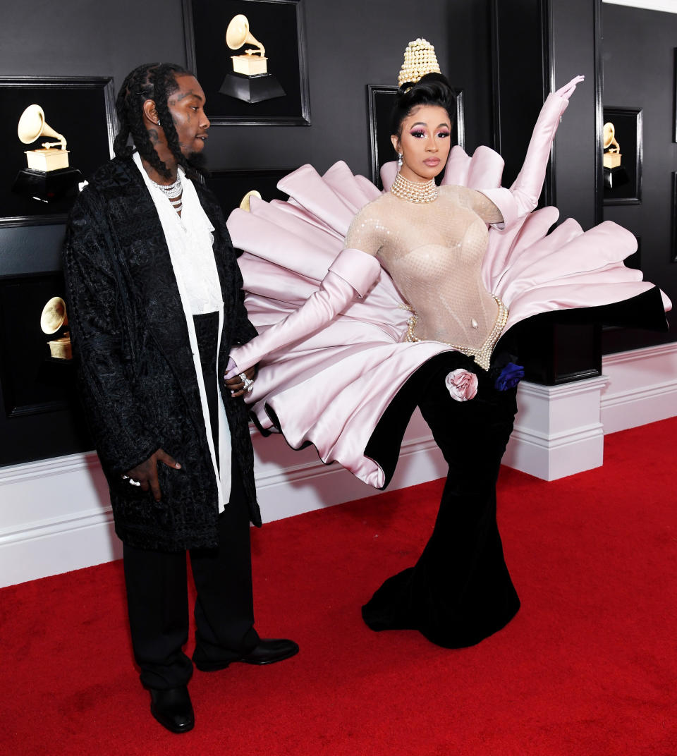 Offset and Cardi B, wearing a 1995 Thierry Mugler gown, at the Grammy Awards on Feb. 10 in Los Angeles.&nbsp;She wore two additional Mugler looks throughout the night. (Photo: Kevin Mazur via Getty Images)