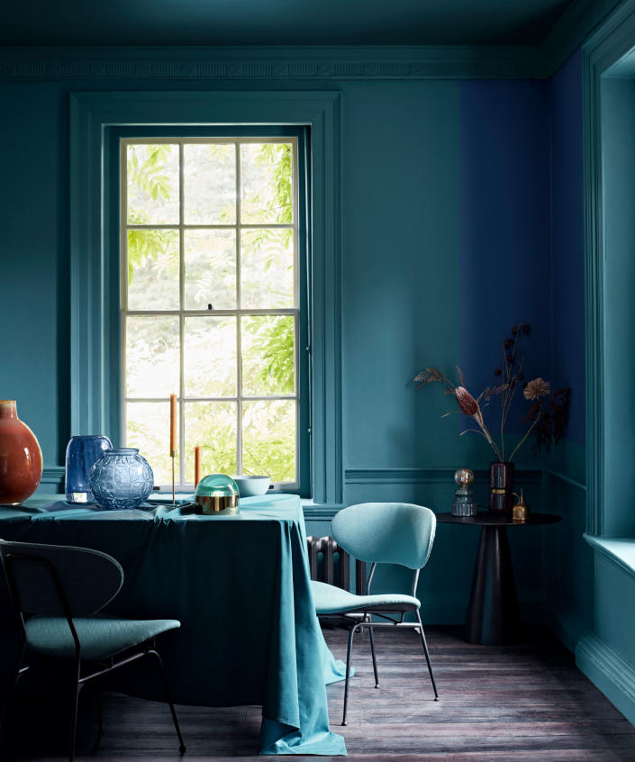 <p> As the dining room is mainly used as a sociable, entertaining space, why not go all-out with your dining room paint ideas to create an unforgettable atmosphere.&#xA0; </p> <p> In this beautiful blue dining room, painted in Teal &amp; Midnight Navy by Crown Paints the stand-out monochromatic color scheme creates a rich and vibrant space that is bursting with colorful charm. Even though the use of paint in this room is daring, the chosen blue shades create a sophisticated atmosphere of elegance and calm. </p> <p> Painting the walls and ceiling the same color and enhancing with coordinating furniture and accessories will ensure for a bold and distinguished design. </p>