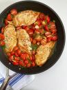 <p>Use an oven-safe skillet for this light and herby one-pan chicken breast recipe.</p><p>Get the <a href="https://www.goodhousekeeping.com/food-recipes/easy/a33839307/skillet-roasted-chicken-and-tomatoes-recipe/" rel="nofollow noopener" target="_blank" data-ylk="slk:Skillet Roasted Chicken and Tomatoes recipe;elm:context_link;itc:0;sec:content-canvas" class="link "><strong>Skillet Roasted Chicken and Tomatoes recipe</strong></a><em>.</em></p>