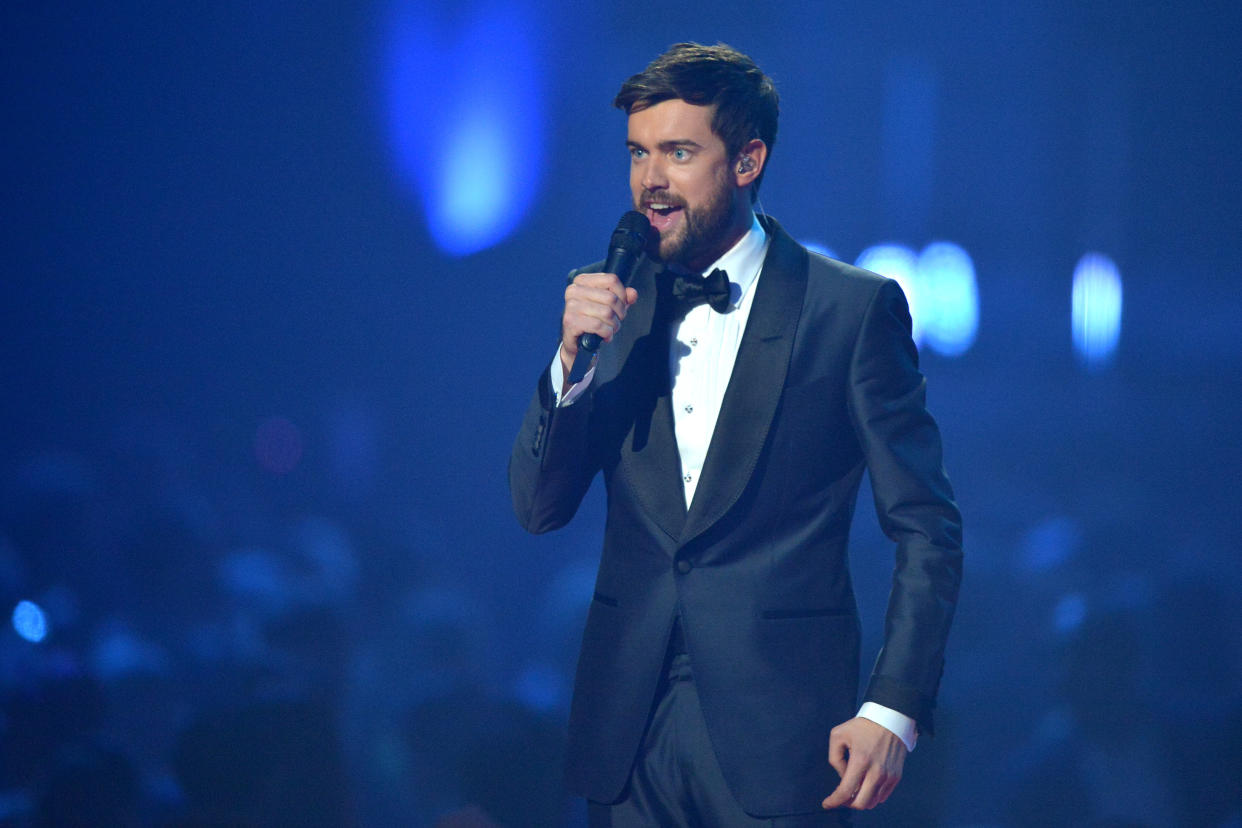 Comedian Jack Whitehall presents on stage during The BRIT Awards 2020 at The O2 Arena on February 18, 2020 in London, England. (Photo by Jim Dyson/Redferns)