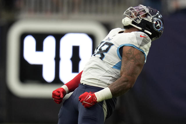 Henry runs for 219 yards, 2 TDs as Titans down Texans 17-10