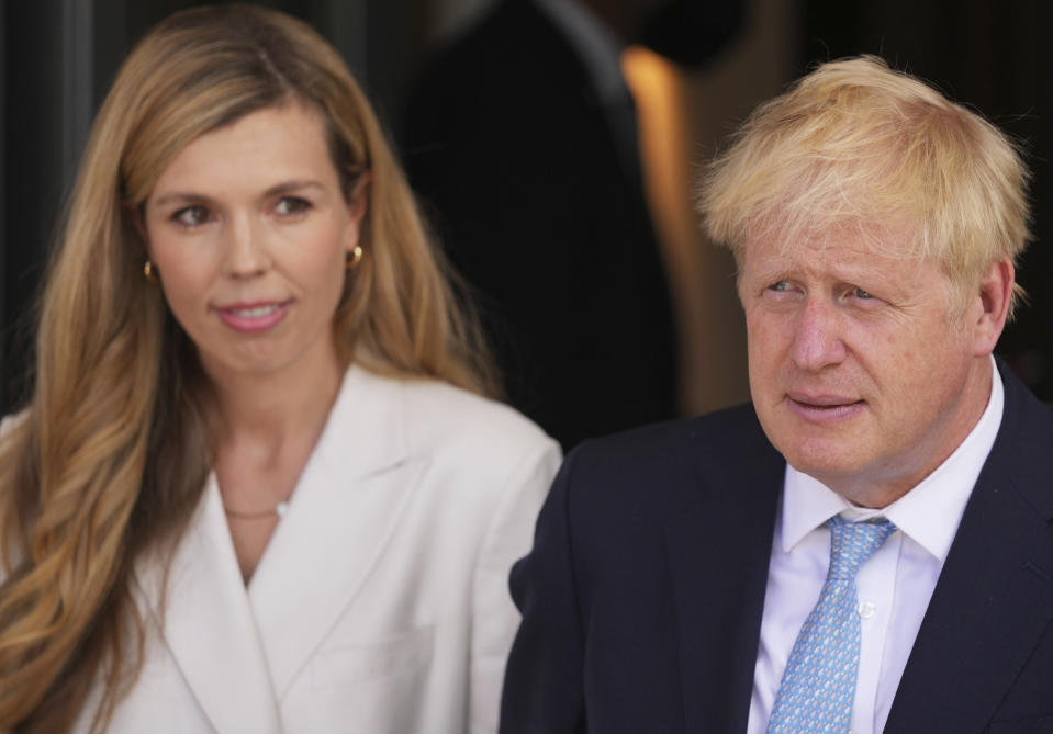 British Prime Minister Boris Johnson and his wife Carrie during the official G7 summit welcome ceremony at Castle Elmau in Kruen, near Garmisch-Partenkirchen, Germany, on Sunday, June 26, 2022. The Group of Seven leading economic powers are meeting in Germany for their annual gathering Sunday through Tuesday. (AP Photo/Matthias Schrader)