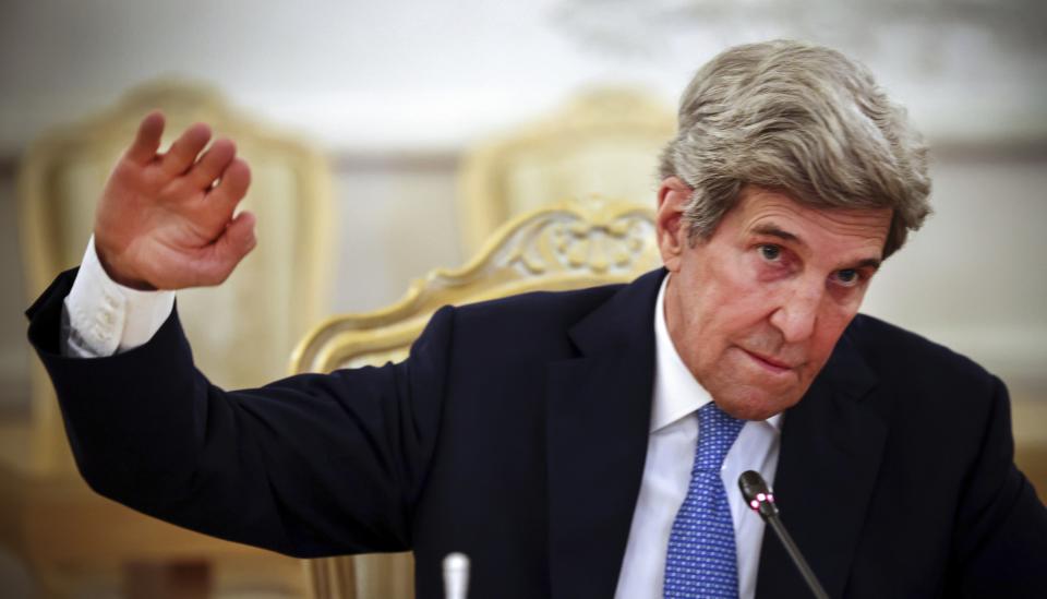 U.S. climate envoy John Kerry gestures while speaking to Russian Foreign Minister Sergey Lavrov during their meeting in Moscow, Russia, Monday, July 12, 2021.(Dimitar Dilkoff/Pool Photo via AP)