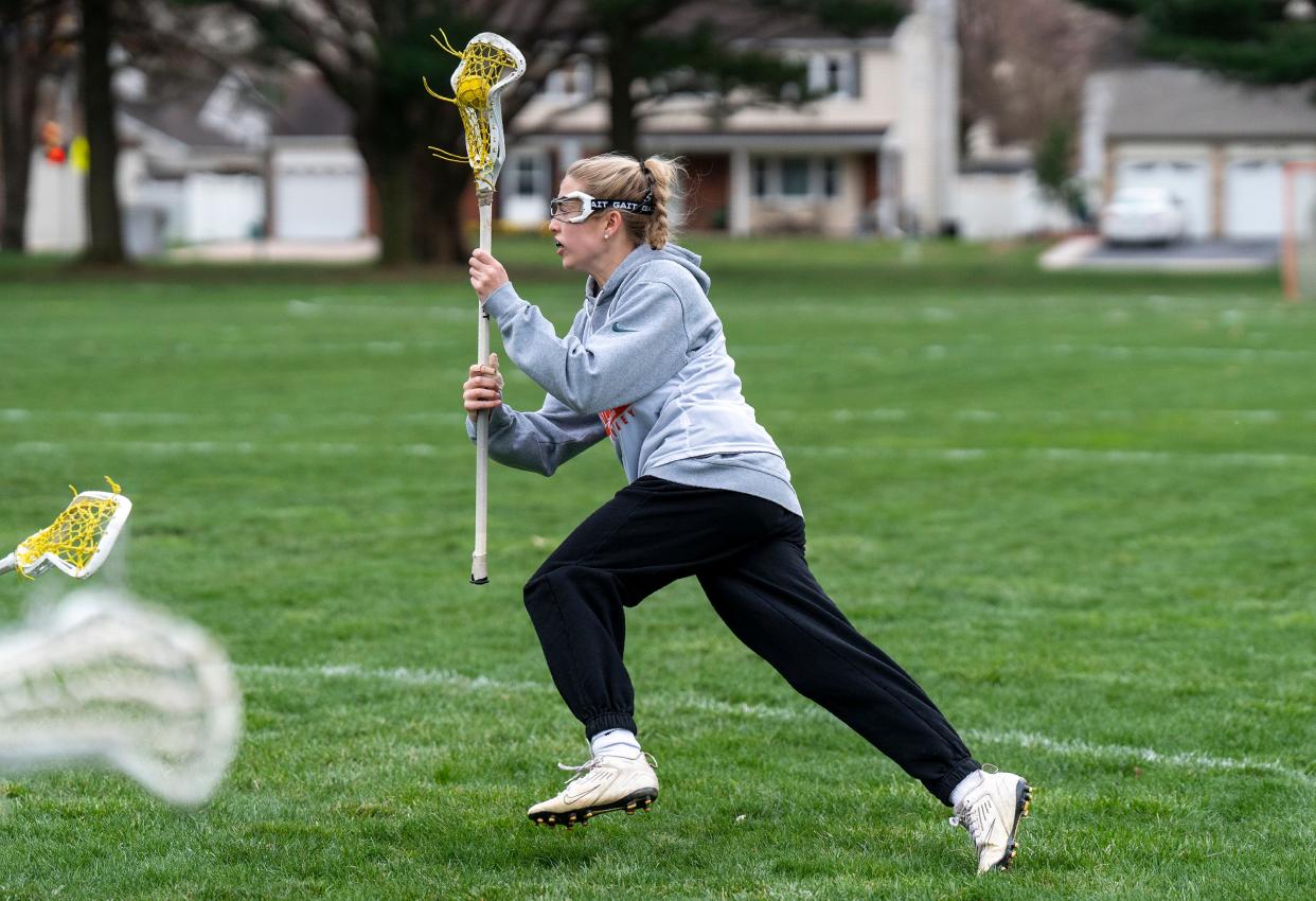 Pennsbury girls' lacrosse's Mia Popovich practices with the team ahead of their upcoming 2024 season in Fairless Hills on Wednesday, March 20, 2024.