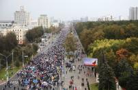 Belarusian opposition supporters hold a rally in Minsk