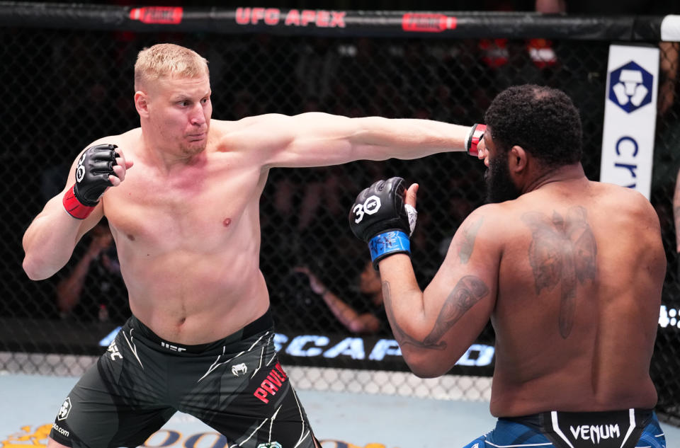 LAS VEGAS, NEVADA - APRIL 22: (L-R) Sergei Pavlovich of Russia punches Curtis Blaydes in a heavyweight fight during the UFC Fight Night event at UFC APEX on April 22, 2023 in Las Vegas, Nevada. (Photo by Chris Unger/Zuffa LLC via Getty Images)