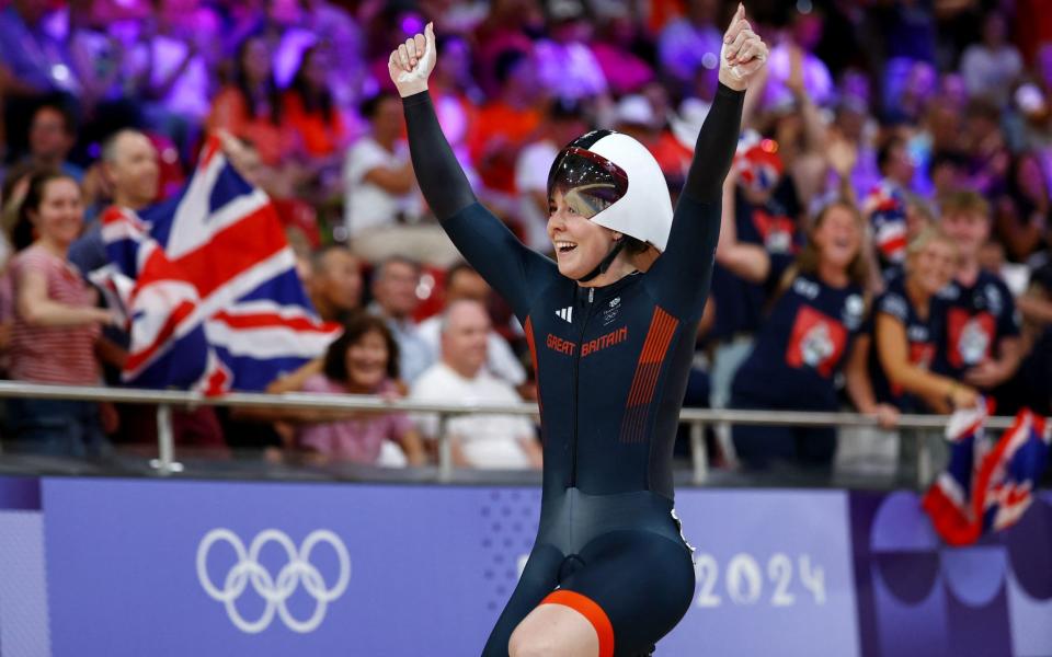 Emma Finucane celebrates winning bronze in the women's sprint