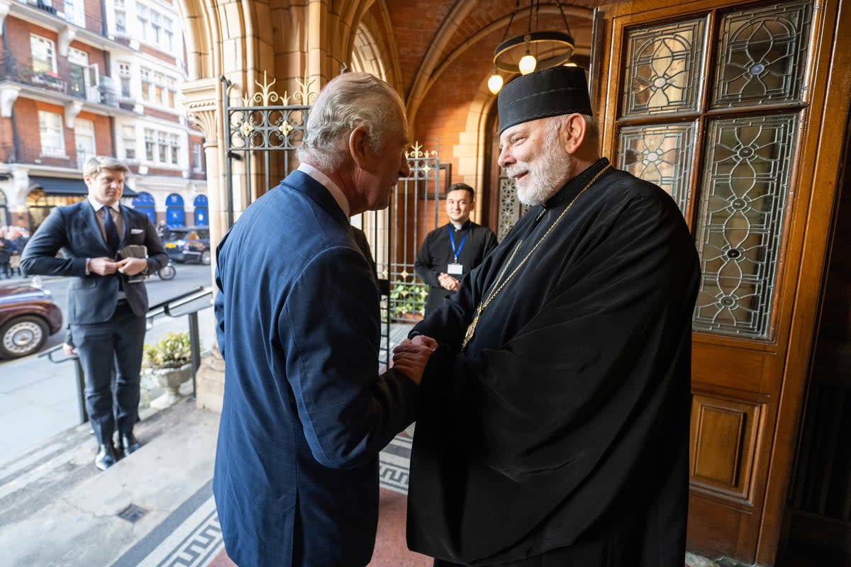 Bishop Kenneth Nowakowski with King Charles outside of his cathedral in London on Wednesday  (Marcin Mazur)