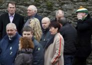 Mourners gather during Martin McGuinness's funeral, at St Columba's Church in Londonderry, Northern Ireland, March 23, 2017. REUTERS/Phil Noble