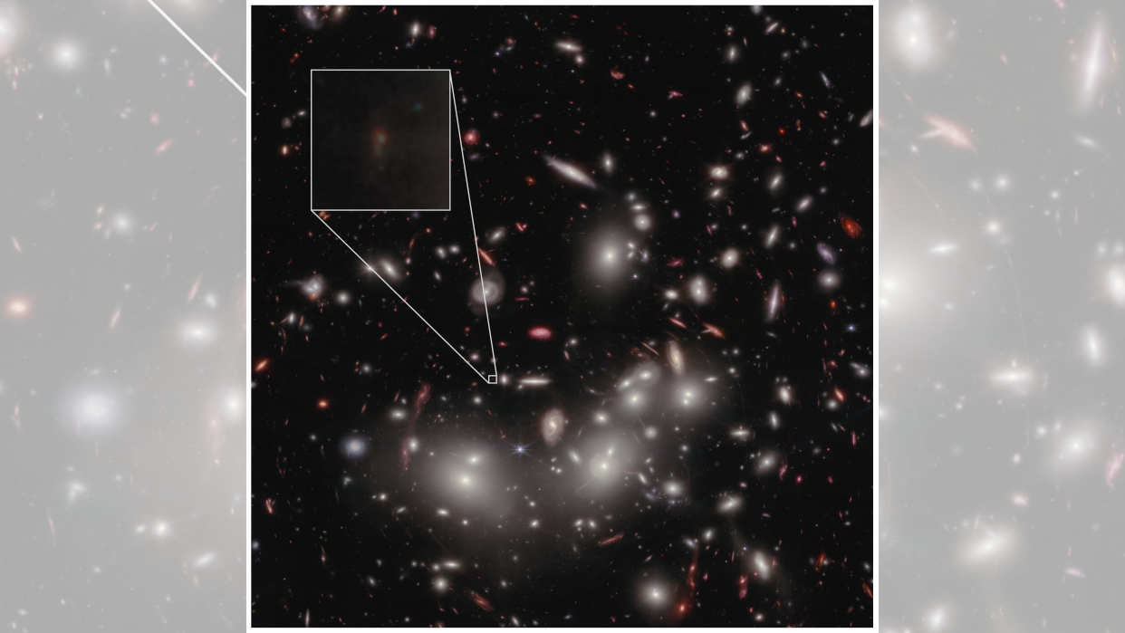  A telescope image of distant galaxies, showing thousands of bright stars and galaxies on a black background. In a zoomed-in box is the pale, faint galaxy detected in this new study. 