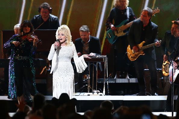 Dolly Parton performs onstage during the 53rd annual CMA Awards at the Bridgestone Arena on November 13, 2019 in Nashville, Tennessee. (Photo by Terry Wyatt/Getty Images,)