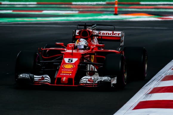 A Ferrari Formula 1 race car driven by Sebastian Vettel is shown on track during the Mexican Grand Prix on October 29, 2017.
