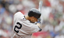 BOSTON, MA - JULY 7: Derek Jeter #2 of the New York Yankees singles during the first inning of game one of a doubleheader against the Boston Red Sox at Fenway Park on July 7, 2012 in Boston, Massachusetts. (Photo by Winslow Townson/Getty Images)