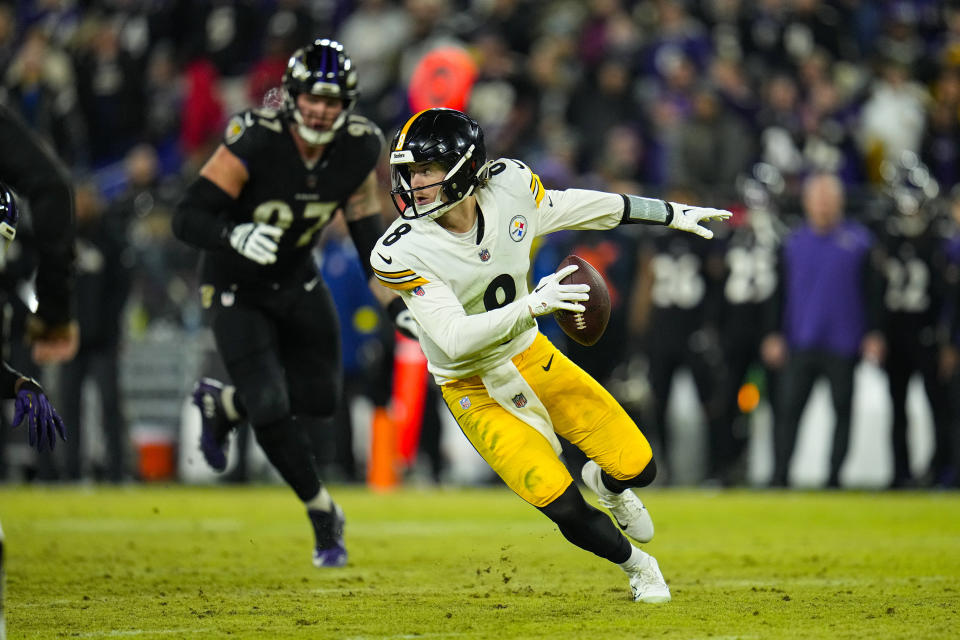 Pittsburgh Steelers quarterback Kenny Pickett (8) scrambles against the Baltimore Ravens in the second half of an NFL football game in Baltimore, Fla., Sunday, Jan. 1, 2023. (AP Photo/Julio Cortez)