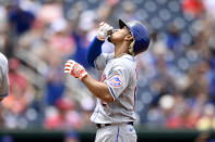 New York Mets' Francisco Lindor reacts after hitting a single in the third inning of the first baseball game of a doubleheader against the Washington Nationals, Saturday, June 19, 2021, in Washington. This is a makeup of a postponed game from April 1. (AP Photo/Nick Wass)