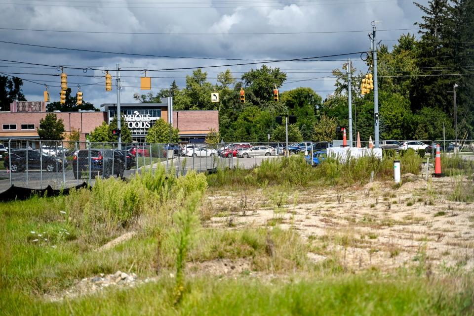 The site of the proposed Trader Joe's grocery store on Monday, Sept. 18, 2023, in East Lansing. In the background is the East Lansing Whole Foods.