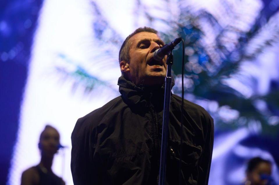 Liam Gallagher performing onstage