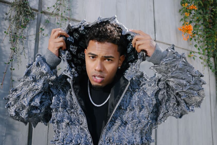 Los Angeles, CA - January 17: Myke Towers, an emerging, Latin Grammy-nominated Puerto Rican rapper, poses for a portrait in West Hollywood on Tuesday, Jan. 17, 2023 in Los Angeles, CA. He is set to release his highly-anticipated third album in early February. (Dania Maxwell / Los Angeles Times).