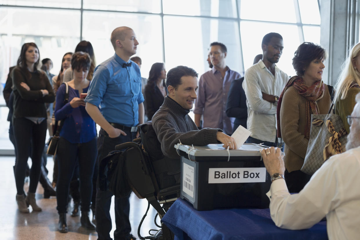 Voters waiting in line at polling place