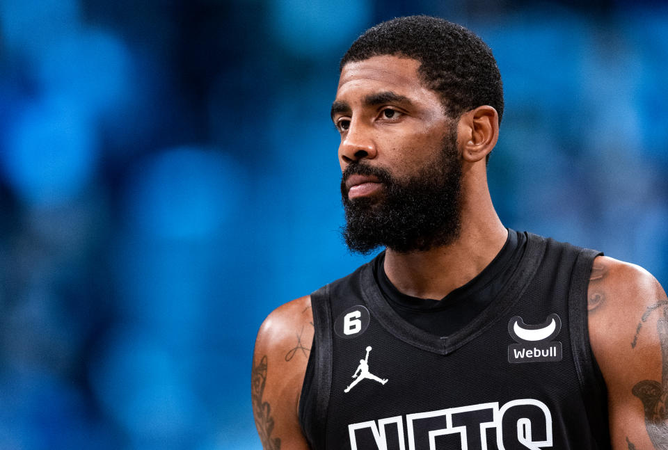 NEW YORK, NEW YORK - OCTOBER 31: Kyrie Irving #11 of the Brooklyn Nets looks on during a break in the action during the first quarter of the game against the Indiana Pacers at Barclays Center on October 31, 2022 in New York City. NOTE TO USER: User expressly acknowledges and agrees that, by downloading and or using this photograph, User is consenting to the terms and conditions of the Getty Images License Agreement. (Photo by Dustin Satloff/Getty Images)